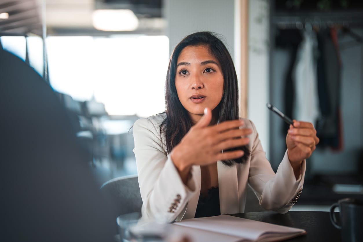 Woman talking to her coworker