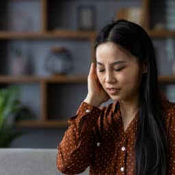 Woman with ear pain