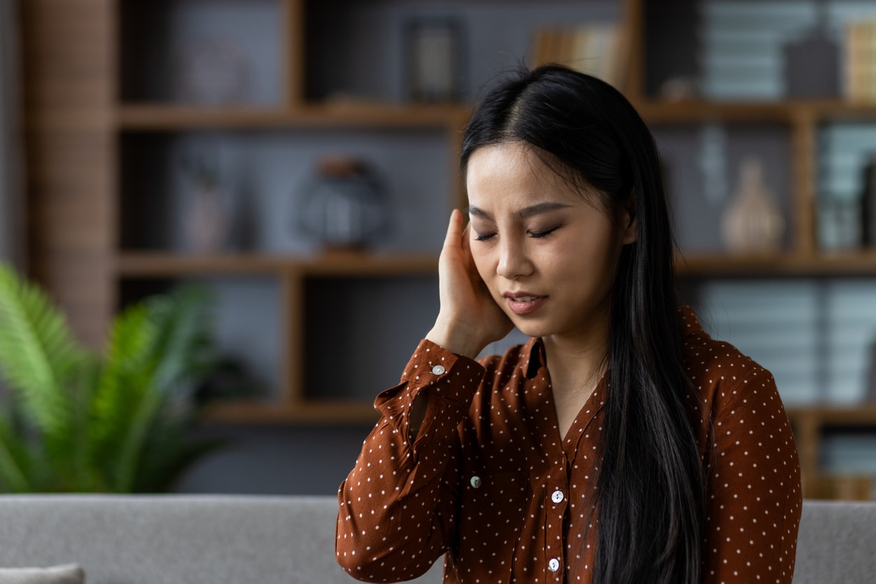 Woman with ear pain.